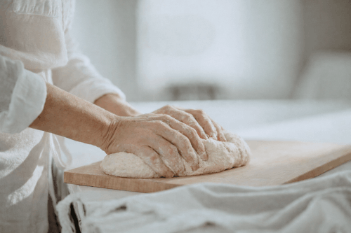 Kneading dough on a woode